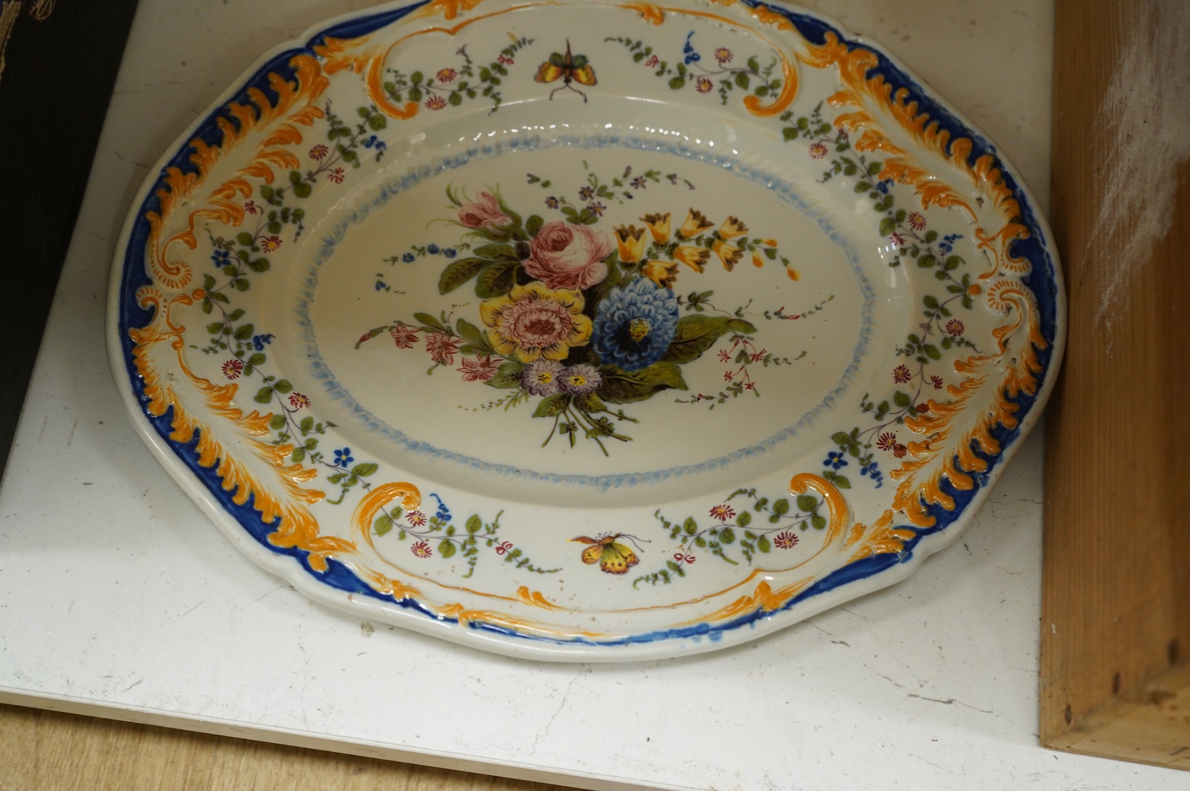 A late 19th century Dresden ink stand and a pair of candlesticks and a Nove faience dish